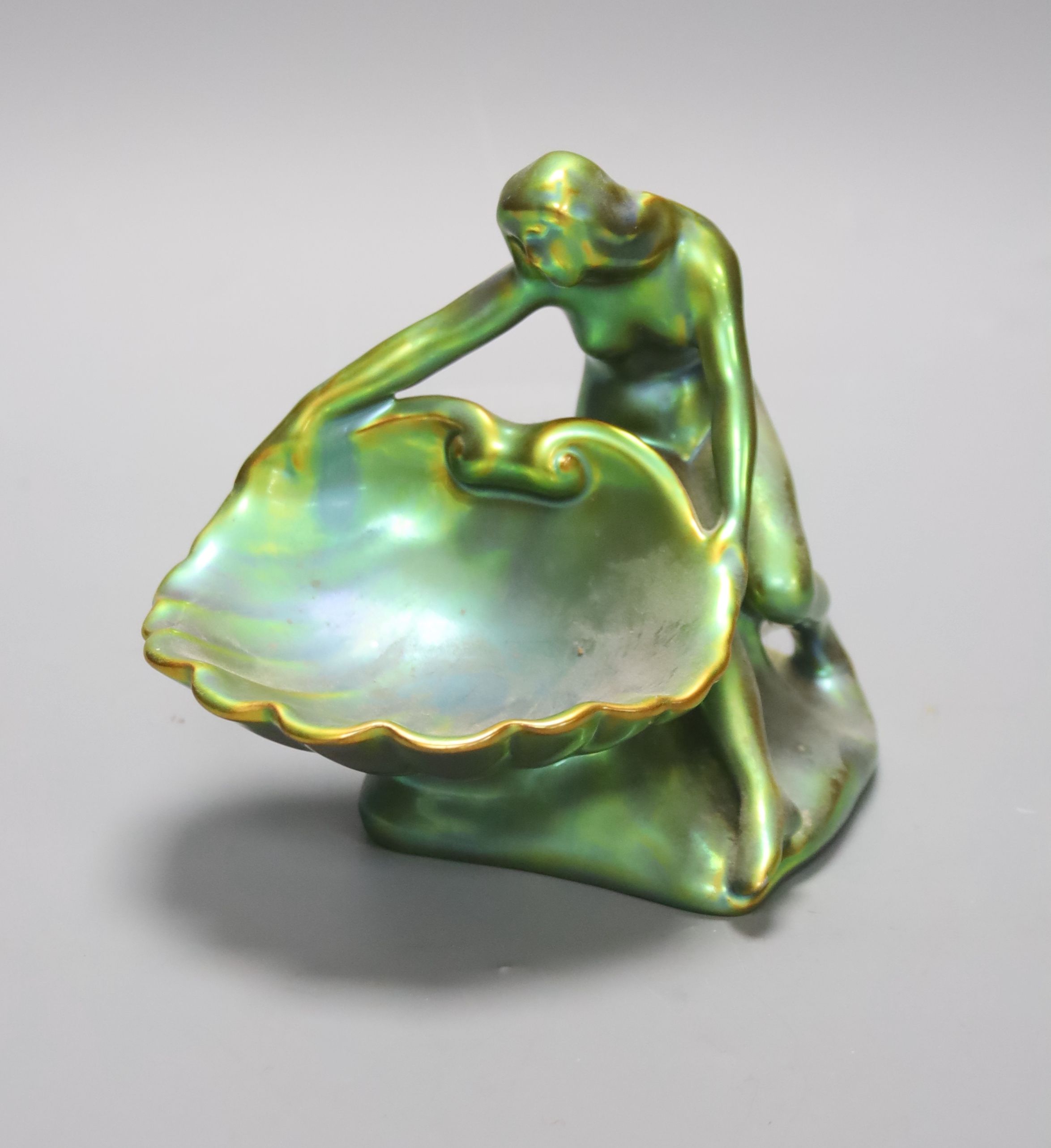 A Zsolnay eosin figural dish, height 12cm